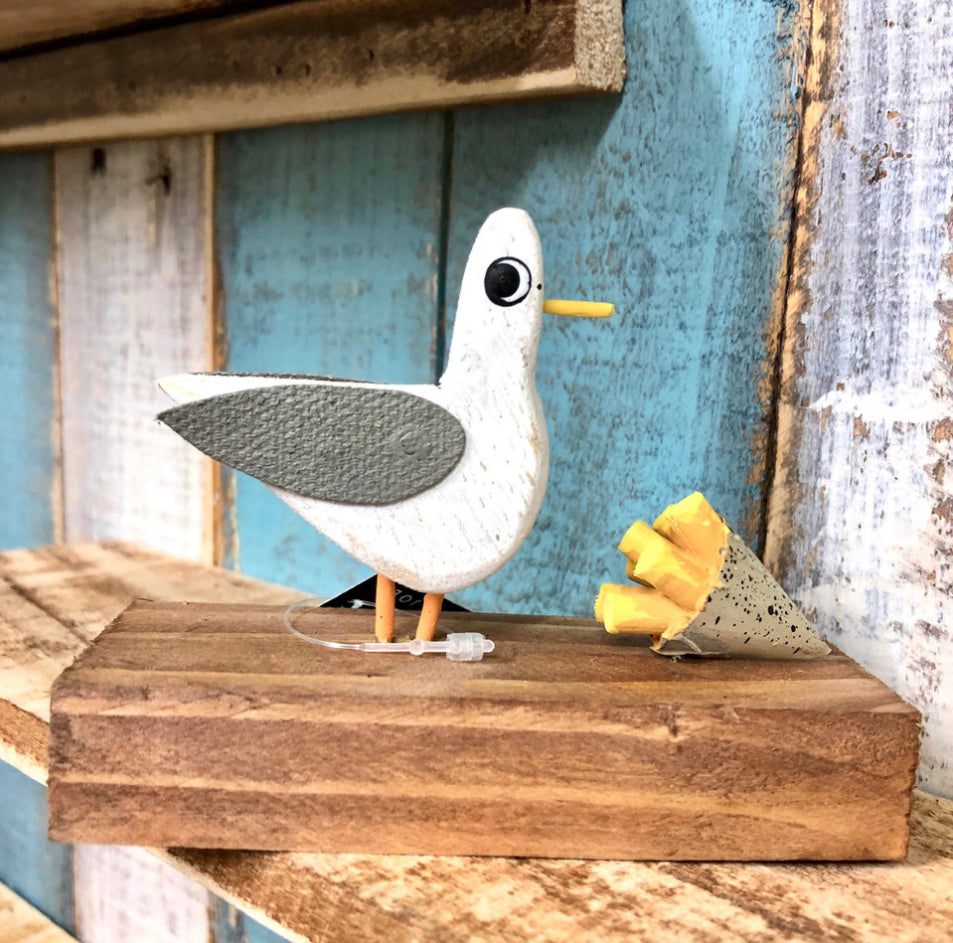 Seagulls lunch. Ornament by Shoeless Joe