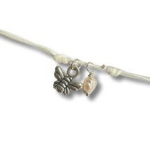 Adjustable cord bracelet with bee & pearl charm