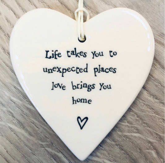 East of India porcelain hanging heart. Life takes you to unexpected places love brings you home.