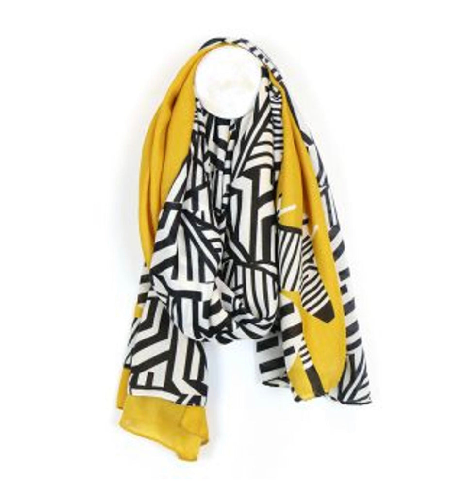 Graphic zebra print scarf with a mustard border by POM