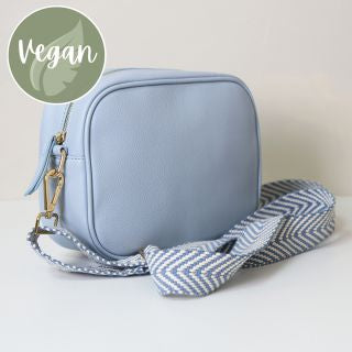 Baby blue Vegan Leather camera bag with removable chevron strap. POM bag