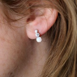 Sterling silver double crystal and white opal stud earrings