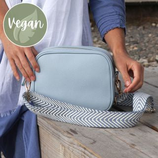 Baby blue Vegan Leather camera bag with removable chevron strap. POM bag