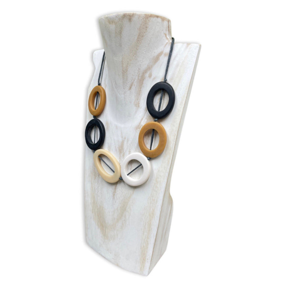 Short resin hoop necklace in tan, black & cream by Suzie Blue.