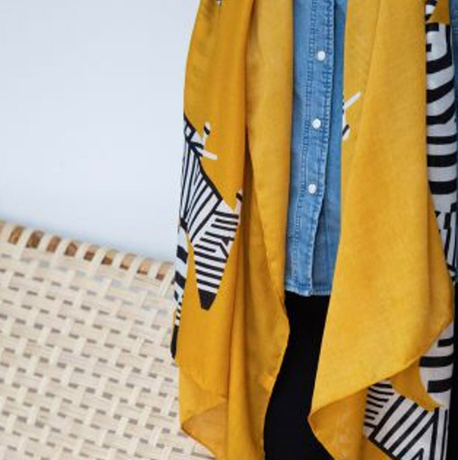 Graphic zebra print scarf with a mustard border by POM