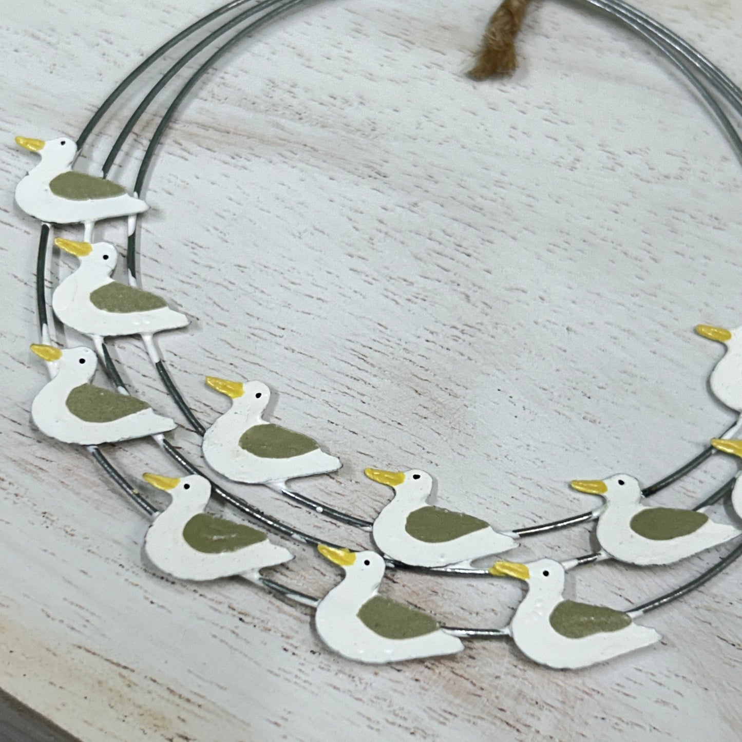Seagull ring hanging decoration.