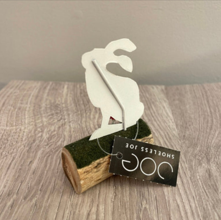 Artic hare standing or sitting on log. Ornament by Shoeless Joe