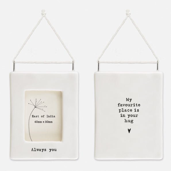My favorite Place is your Hug.  Small ceramic photo frame