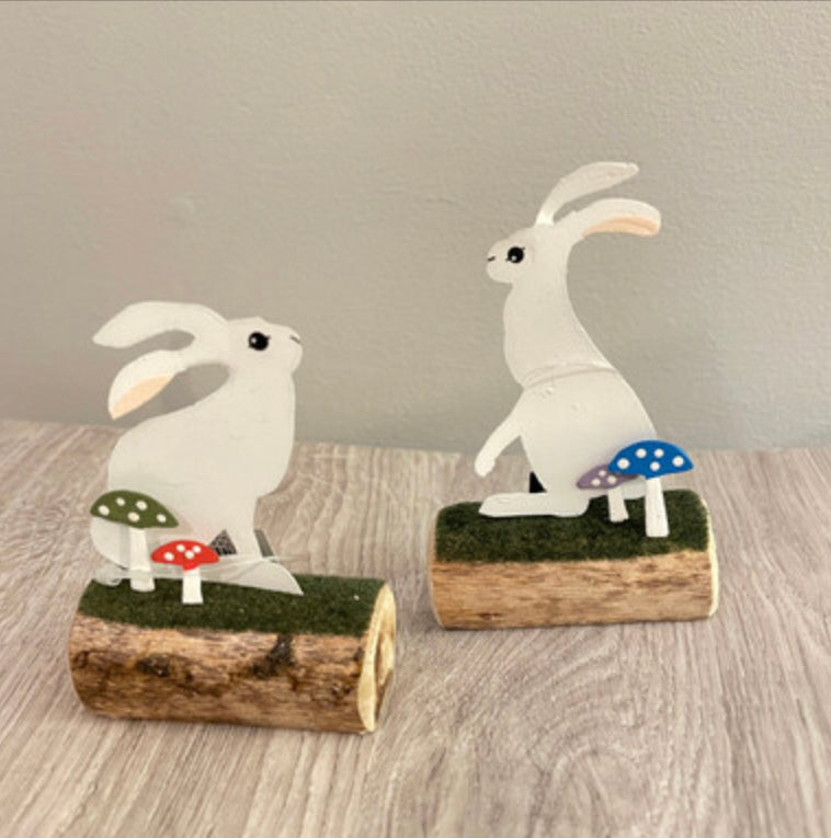 Artic hare standing or sitting on log. Ornament by Shoeless Joe