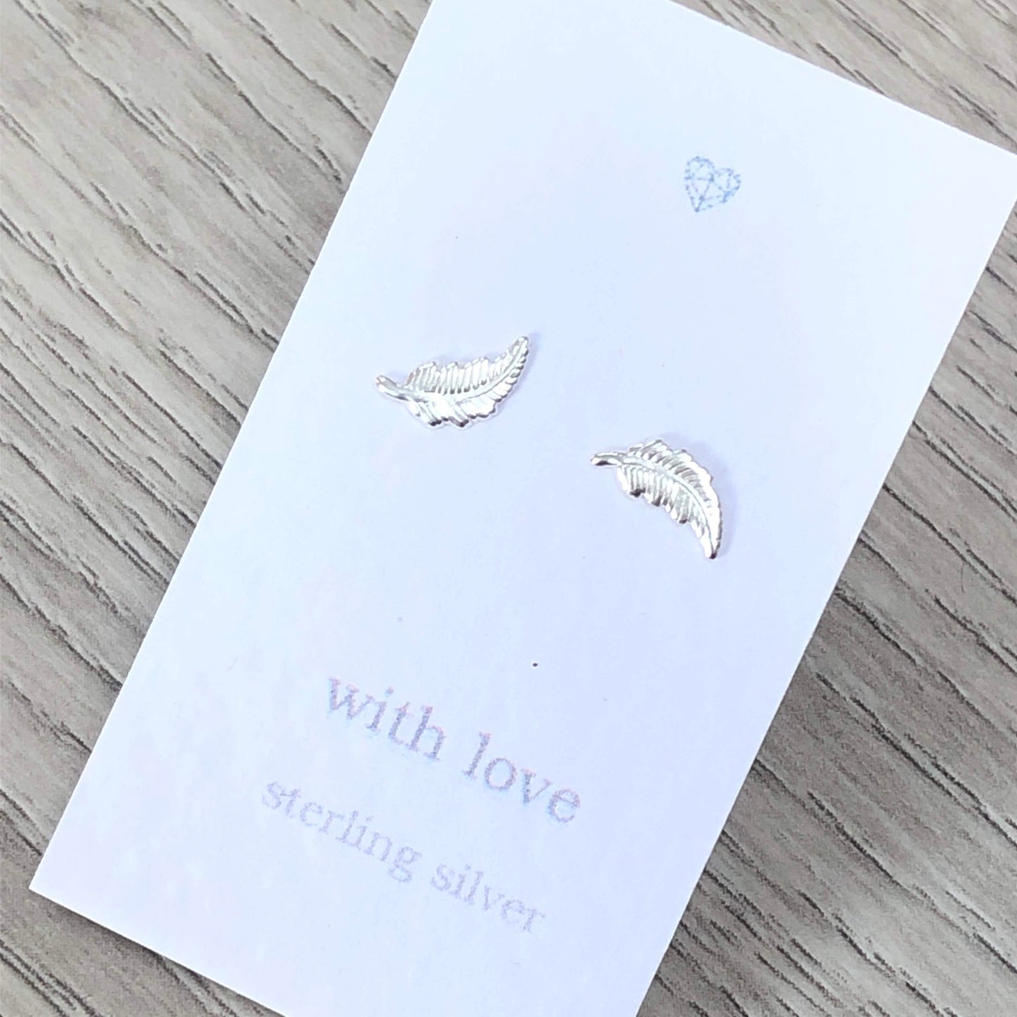 Feather sterling silver stud earrings