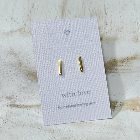 Gold bar stud earrings.