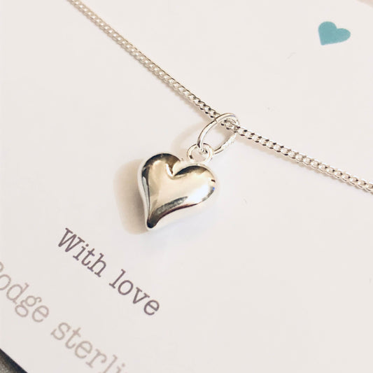 Sterling silver puff heart necklace.