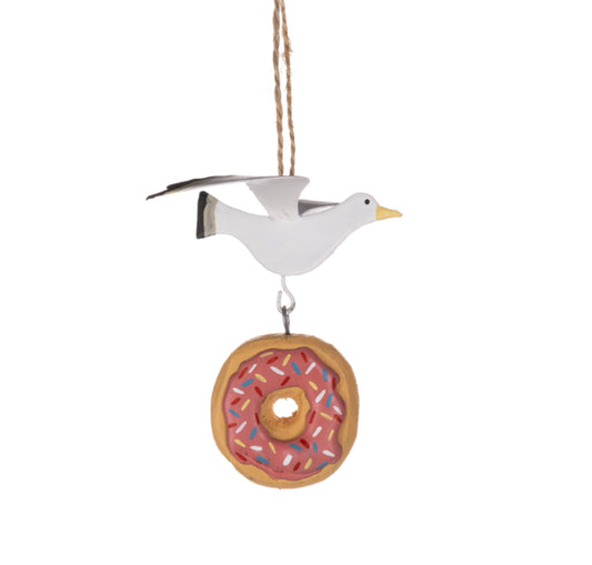 Seagull steals doughnut hanging decoration by shoeless Joe