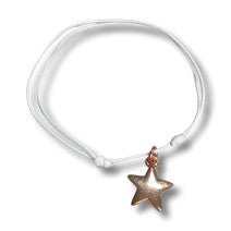 Adjustable cord bracelet with a rose gold star charm