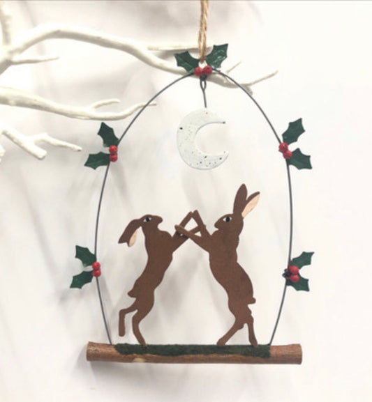 Boxing hares under the moon. Hanging Christmas decoration by Shoeless Joe