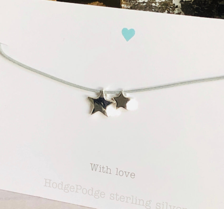 Double star sterling silver charm bracelet