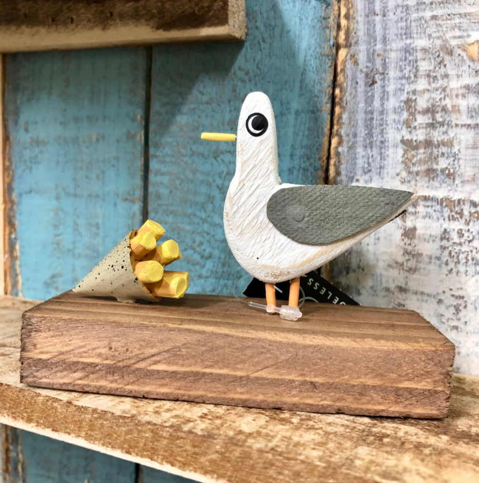 Seagulls lunch. Ornament by Shoeless Joe