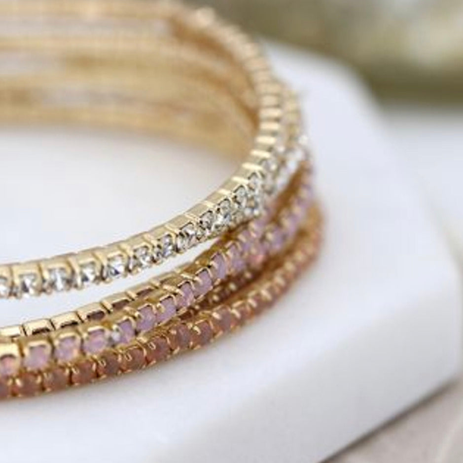 Multi strand gold plated & blush crystal bracelets by Pom