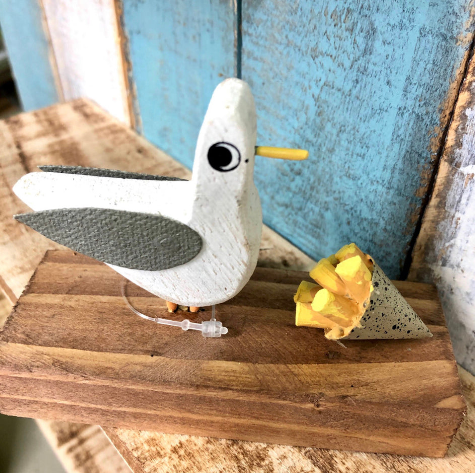 Seagulls lunch. Ornament by Shoeless Joe