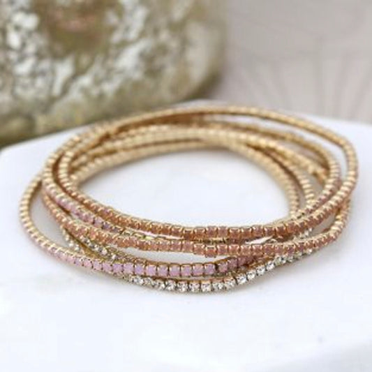 Multi strand gold plated & blush crystal bracelets by Pom