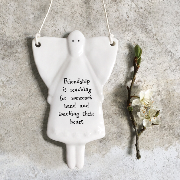 Friendship is reaching for someone’s hand and touching their heart. Hanging porcelain angel by east of India