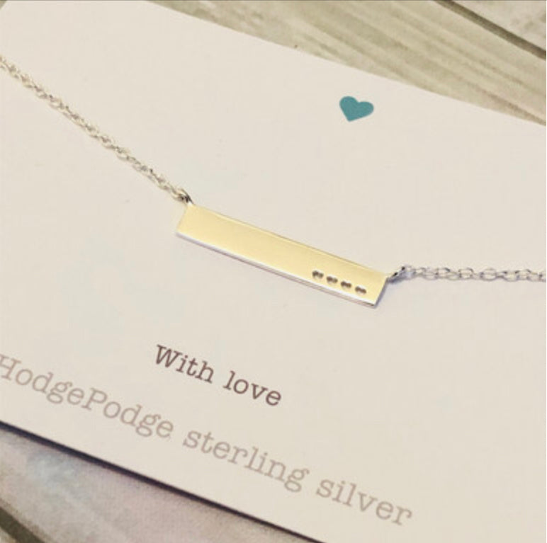 Sterling silver bar with heart cut-outs necklace