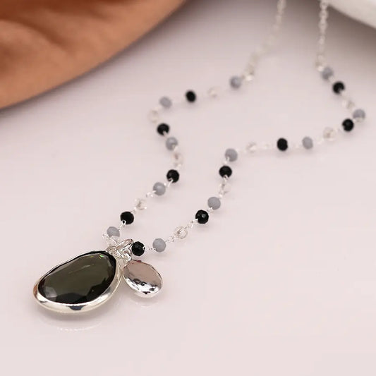 Silver plated and grey bead necklace with smoky drop