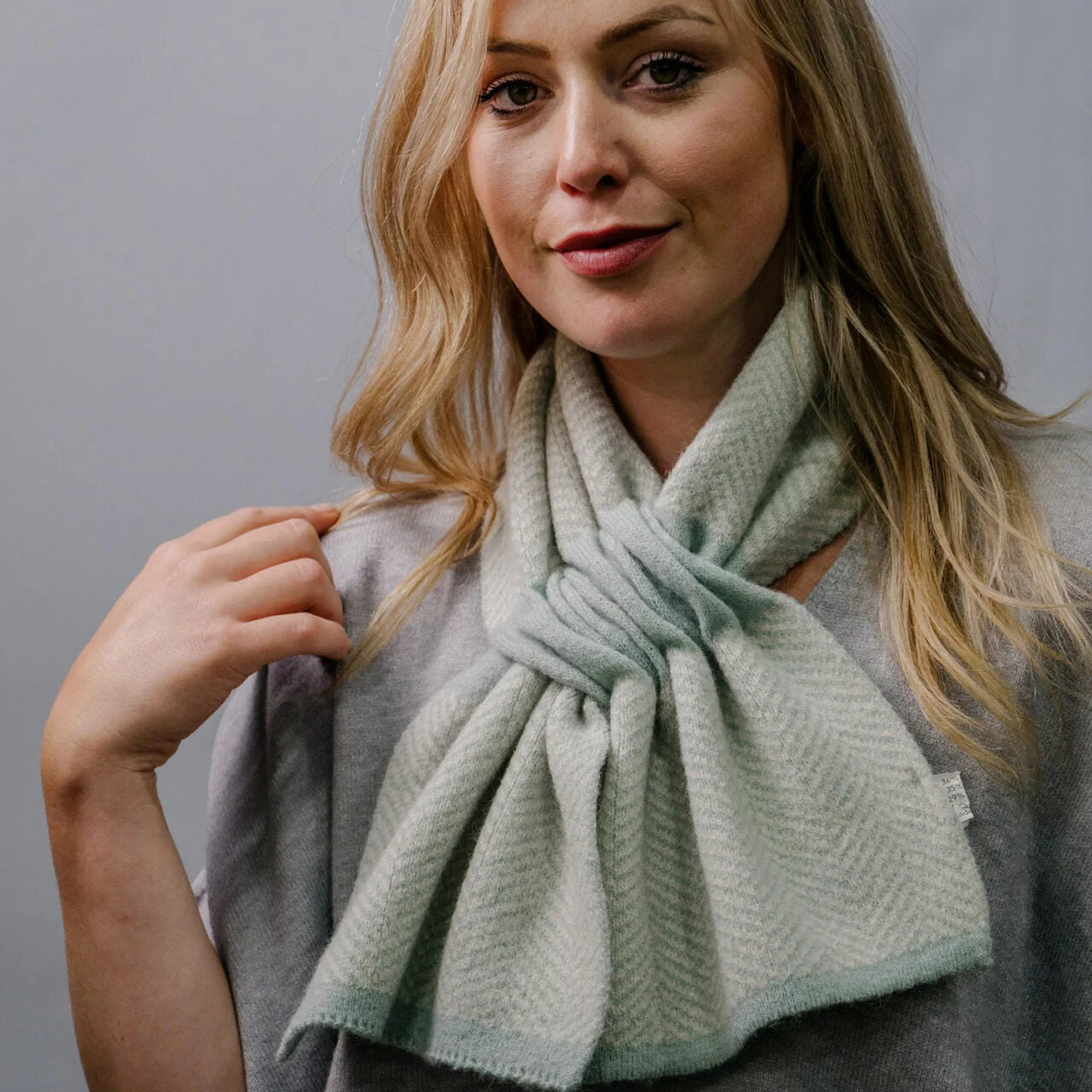 Herringbone design duck egg green pull through scarf