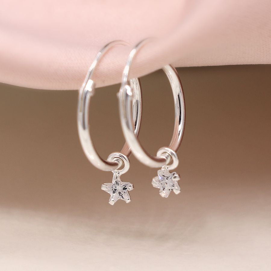 Sterling silver creole hoop earrings with CZ star charms