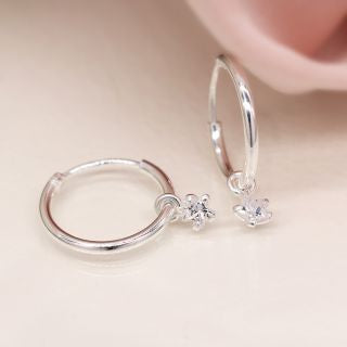 Sterling silver creole hoop earrings with CZ star charms