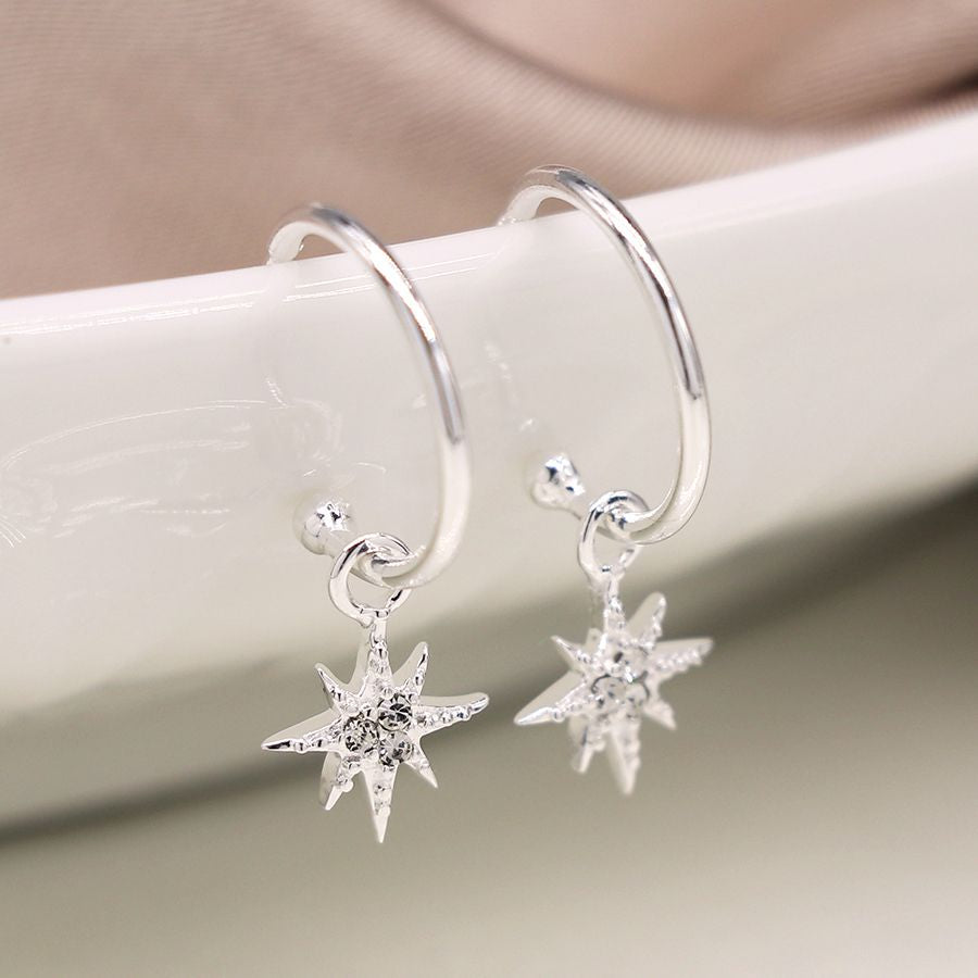 Sterling silver sleeper earrings with rhinestone inset stars